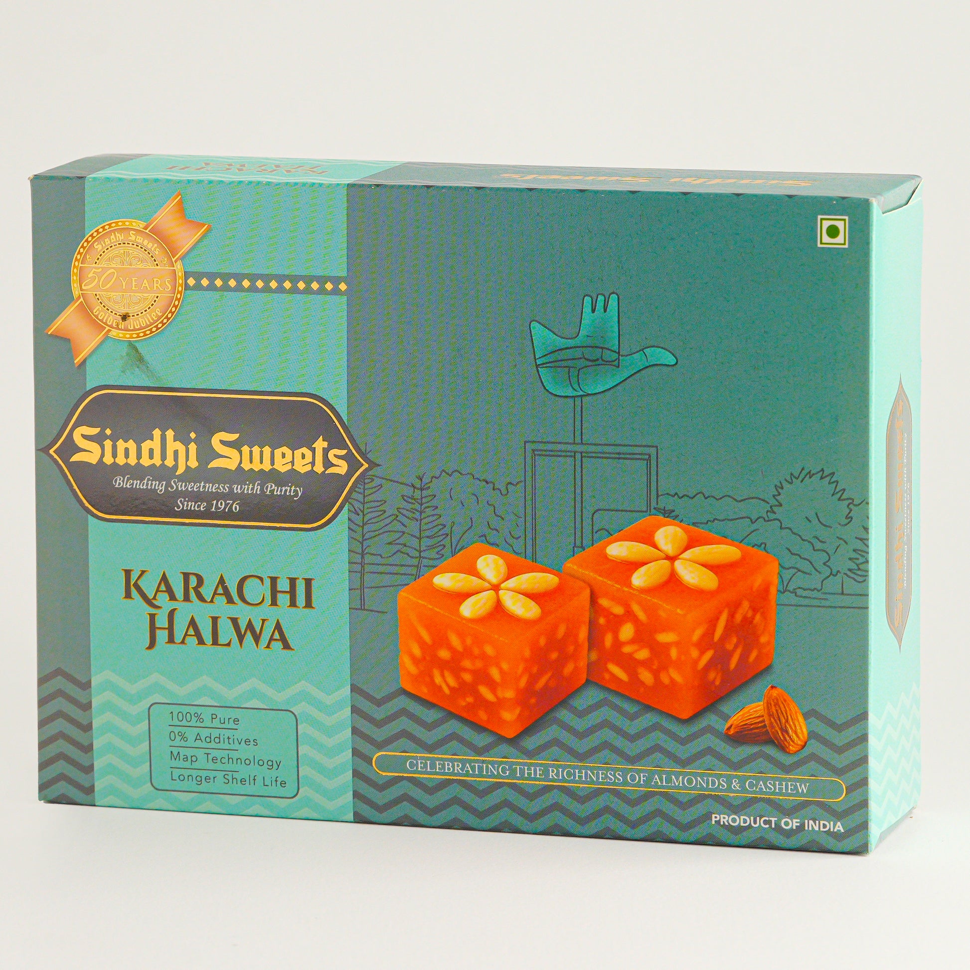 Box of Sindhi Sweets Karachi Halwa with a teal background