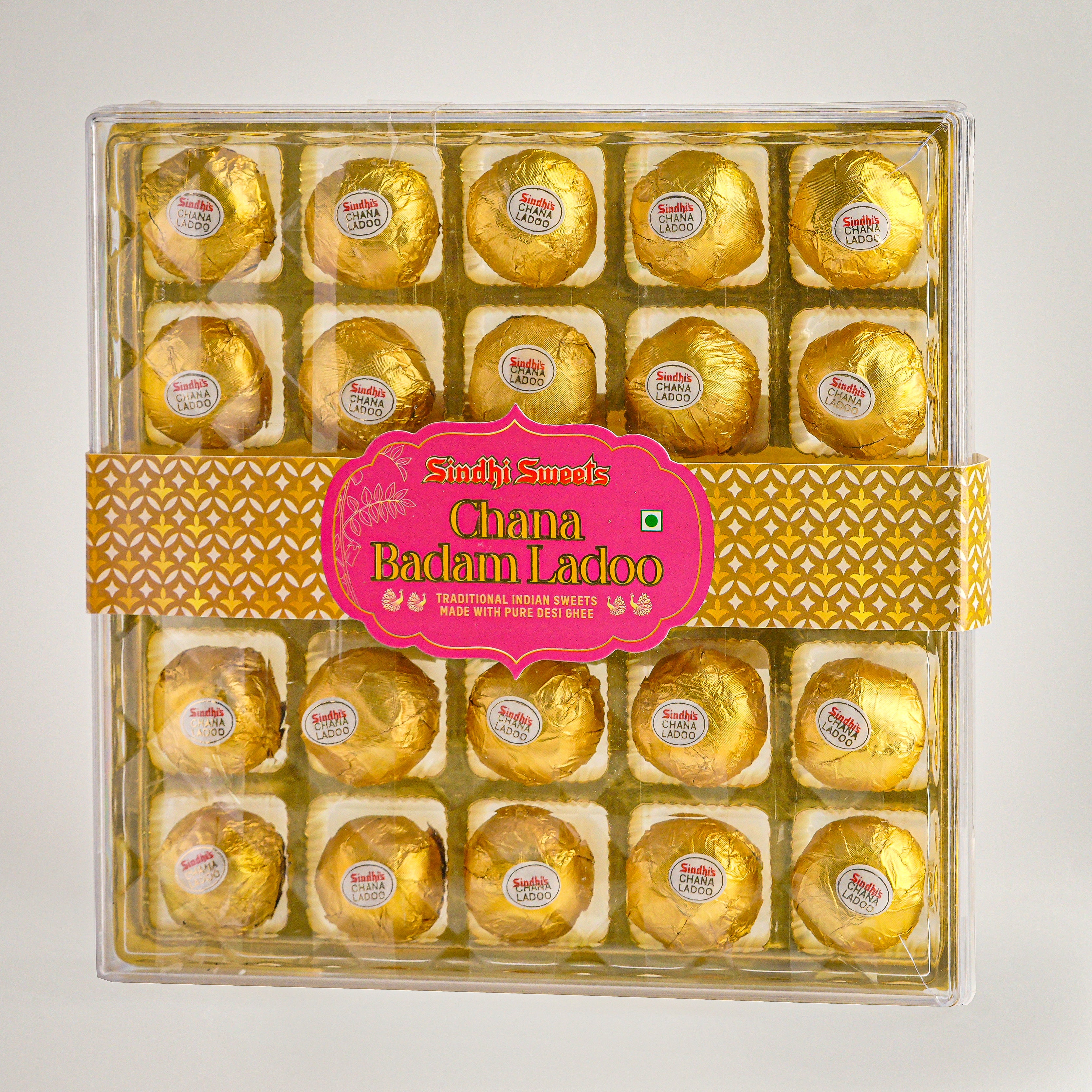 Packaged Chana Badam Ladoo with a pink label on a white background