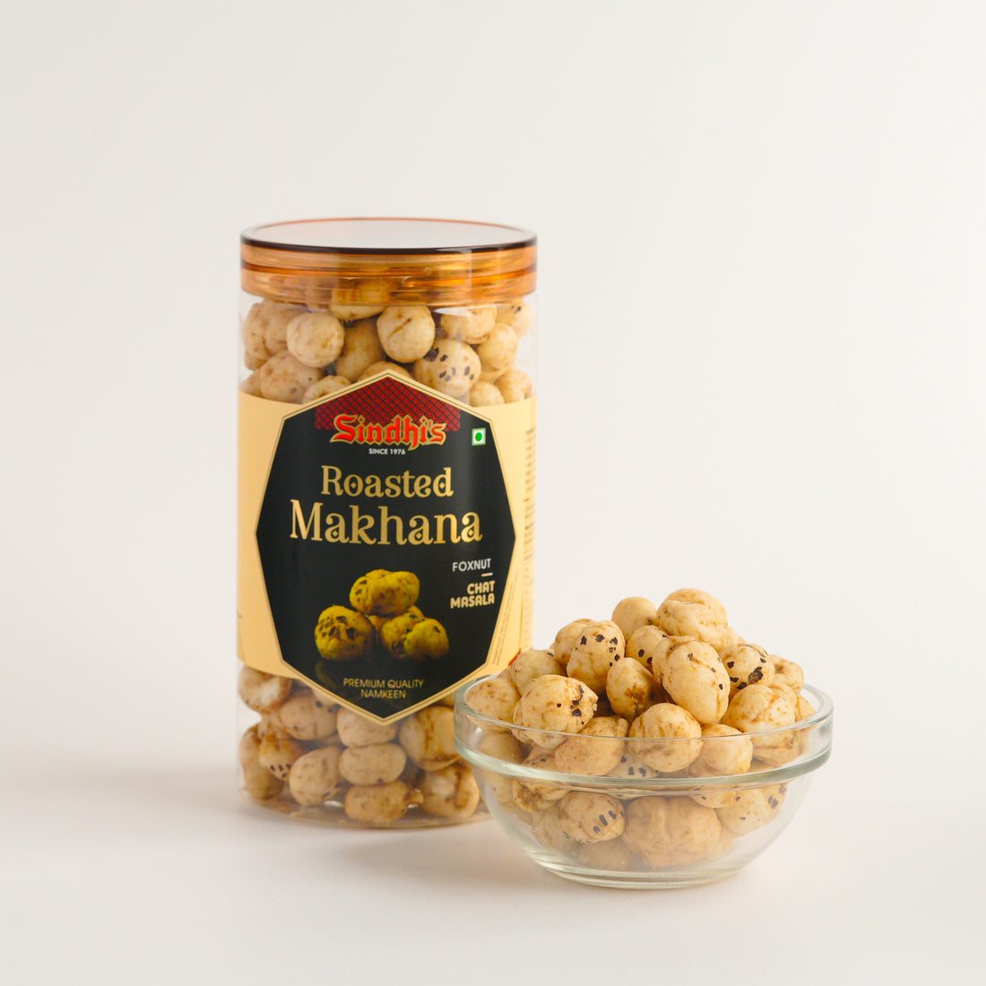Jar and bowl of roasted makhana with Sindhi's label on a white background