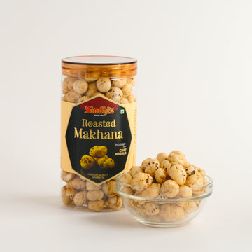 Jar and bowl of roasted makhana with Sindhi's label on a white background