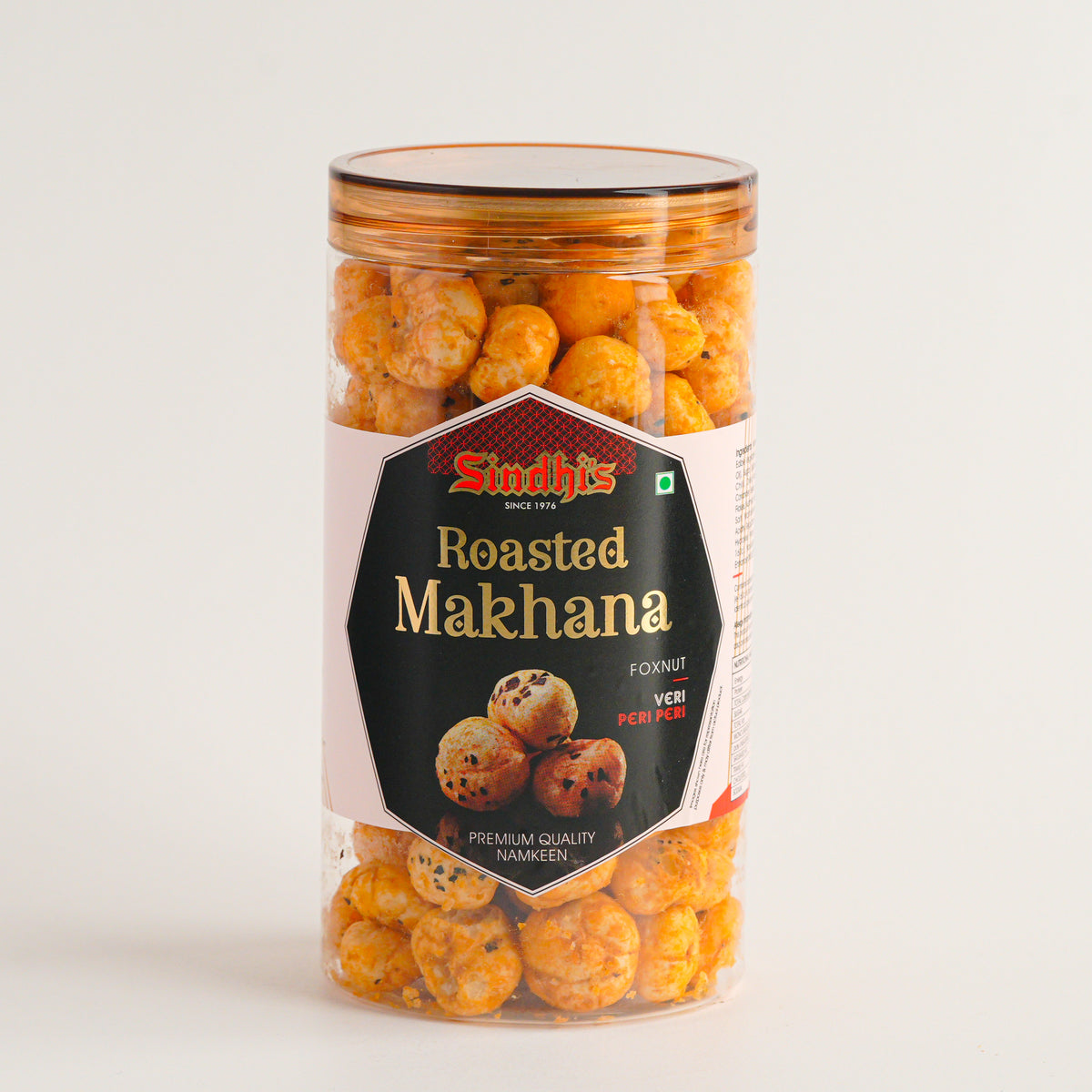 Jar of roasted makhana with a visible brand label on a light background