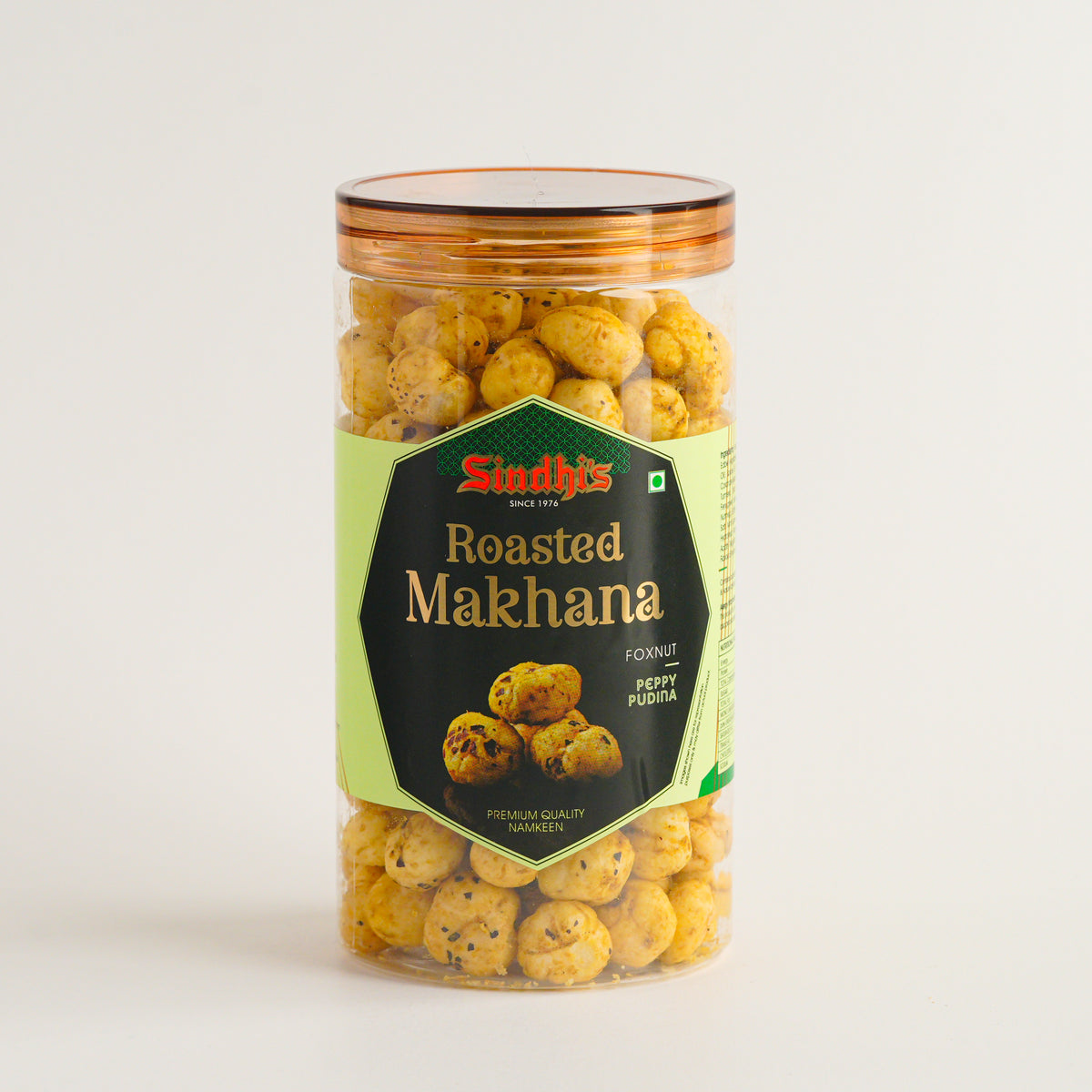 Jar of roasted makhana with a green label on a light background