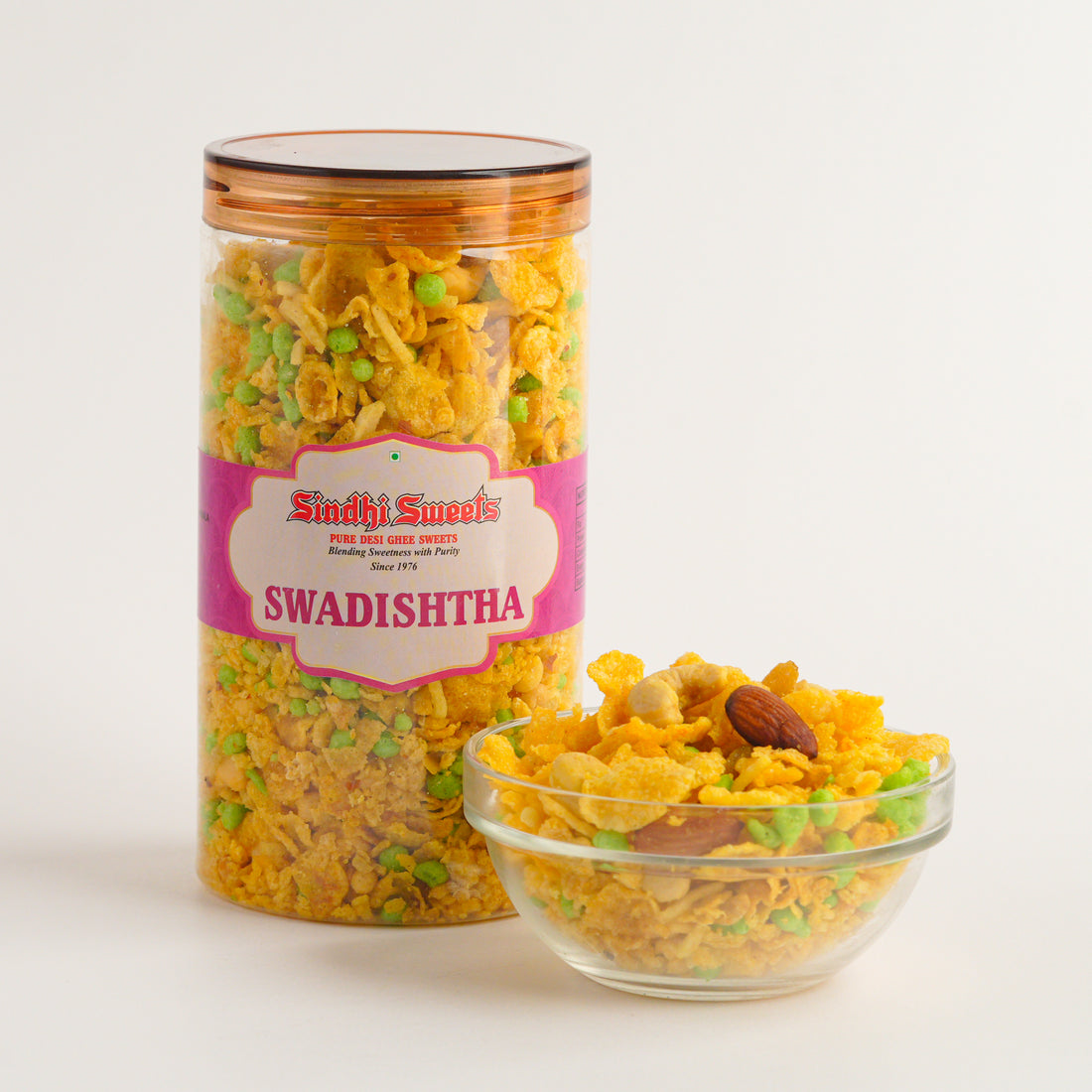 Jar of Swadishtha with a bowl of the product on a white background
