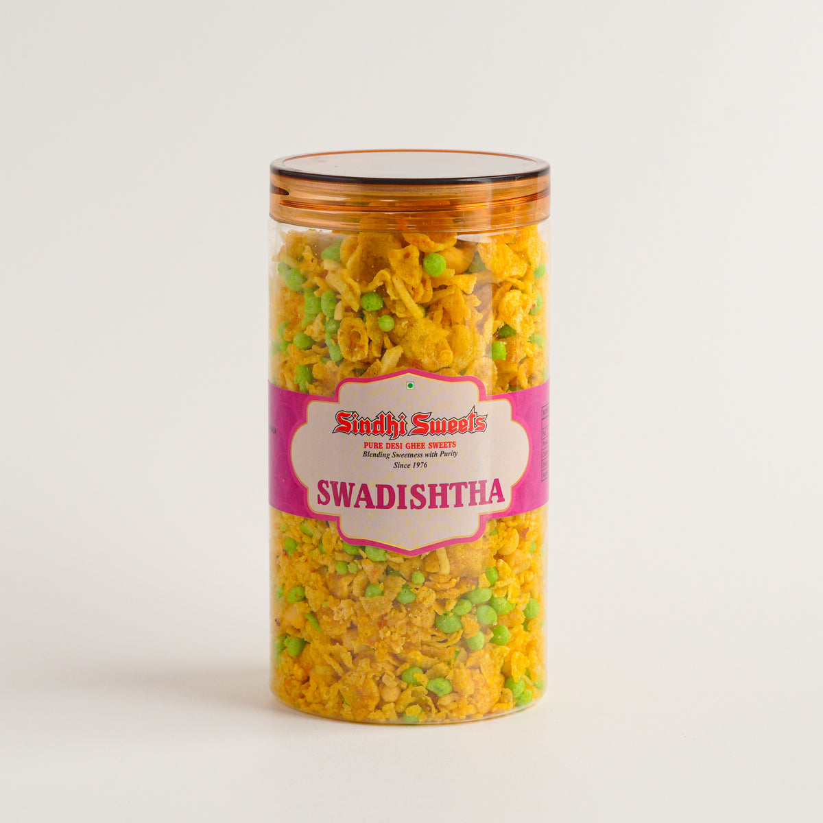 Jar of Sindhi Sweets Swadishtha on a light background