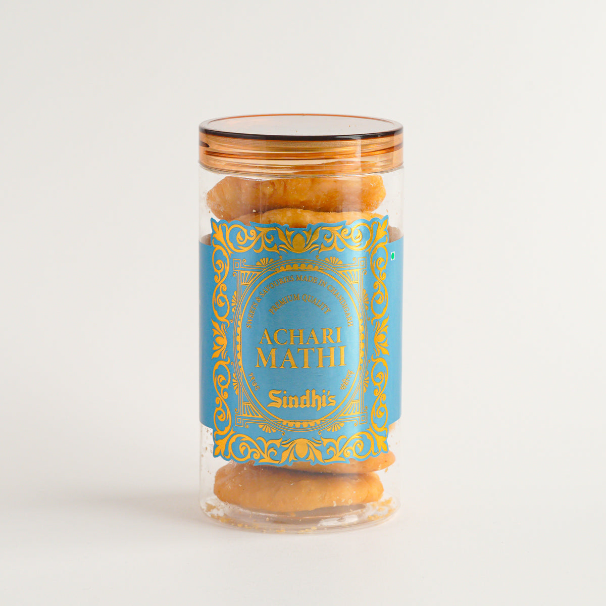 Jar of 'Achari Mathi' with decorative blue label on a white background