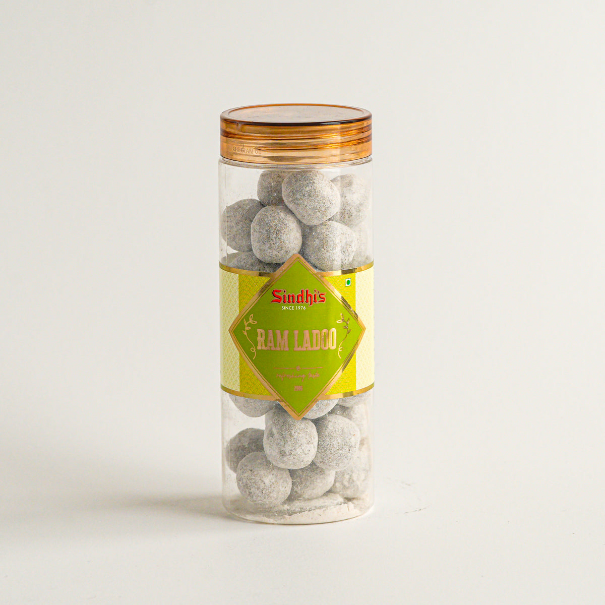 Jar of Sindh's Ram Ladoo on a white background