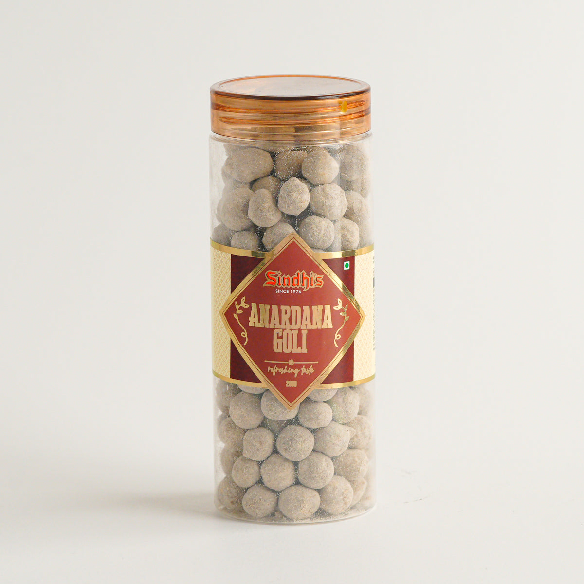 Tall cylindrical container with a gold lid and label featuring text and graphics on a white background
