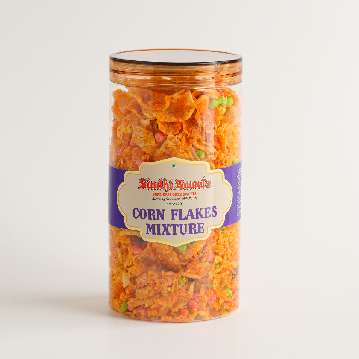 Jar of Sindhi Sweets Corn Flakes Mixture on a light gray background