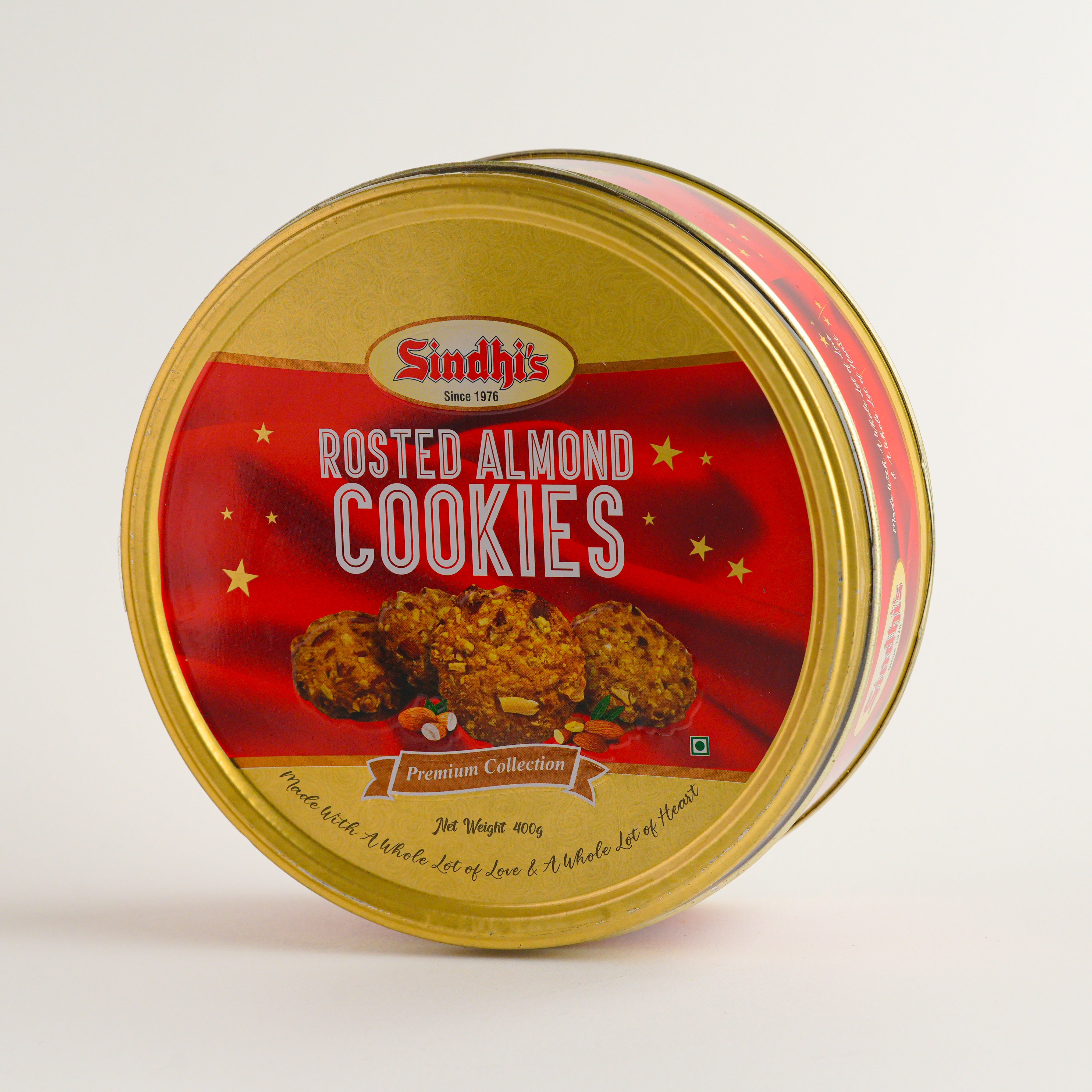 Tin of Sindhi's Roasted Almond Cookies with a red label on a white background