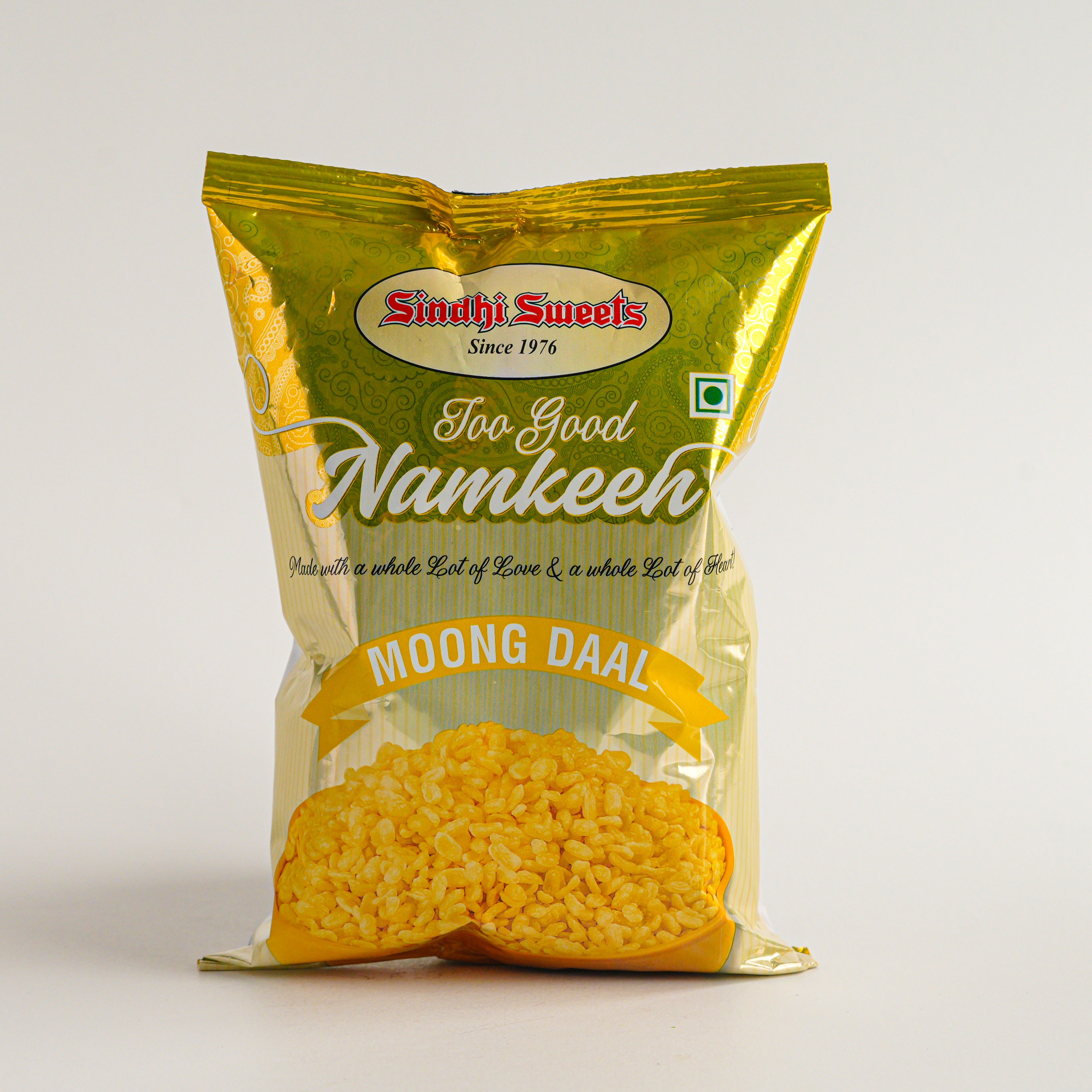Packaged snack with 'Sinha Sweets' branding on a white background