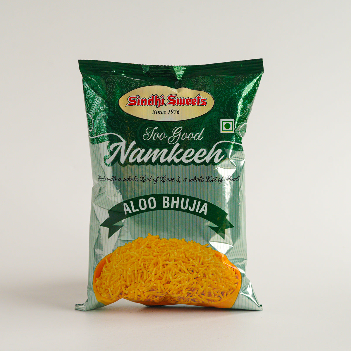 Packaged snack with 'Sindhi Sweets' branding on a white background