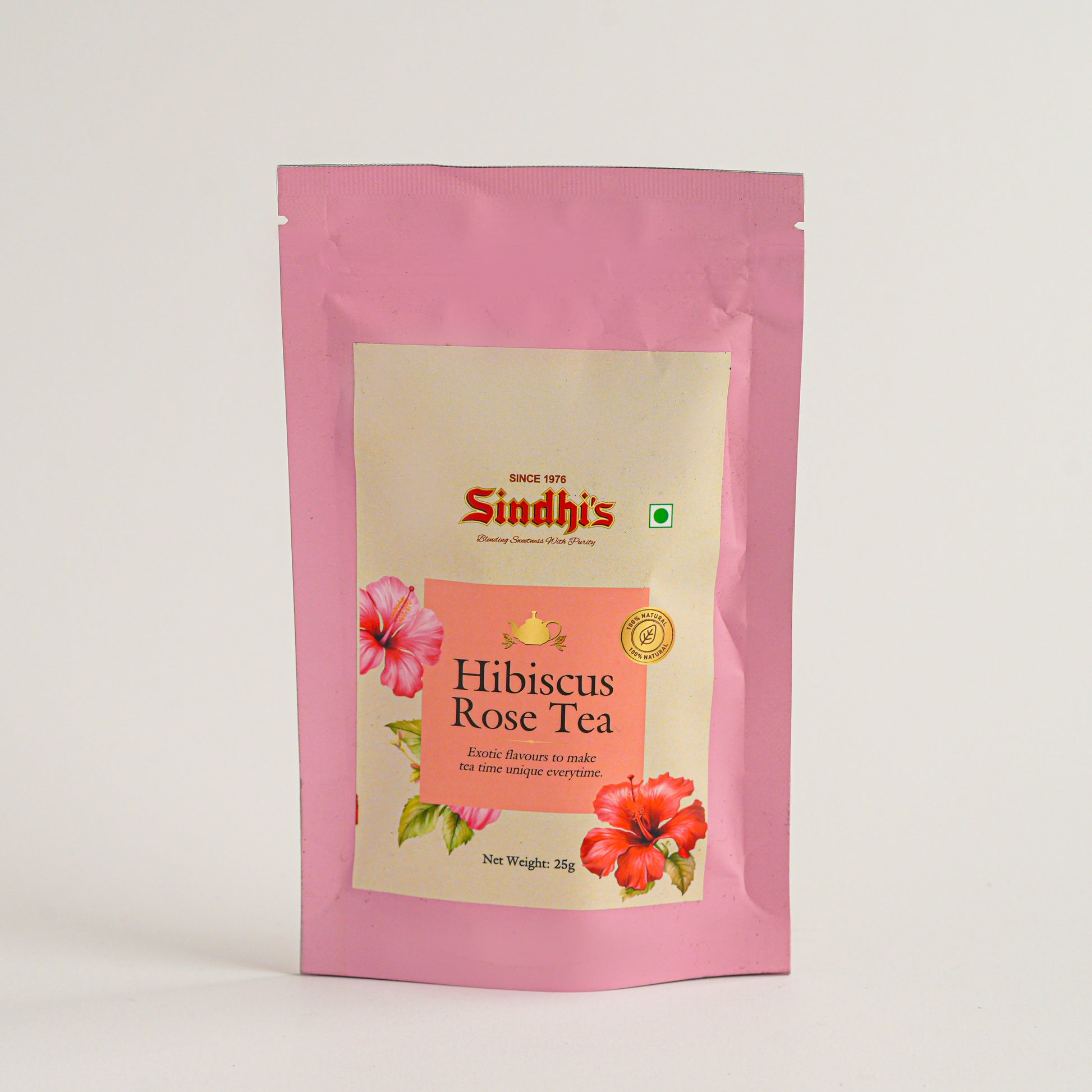 Sindhi's Hibiscus Rose Tea package with pink and beige design on a white background