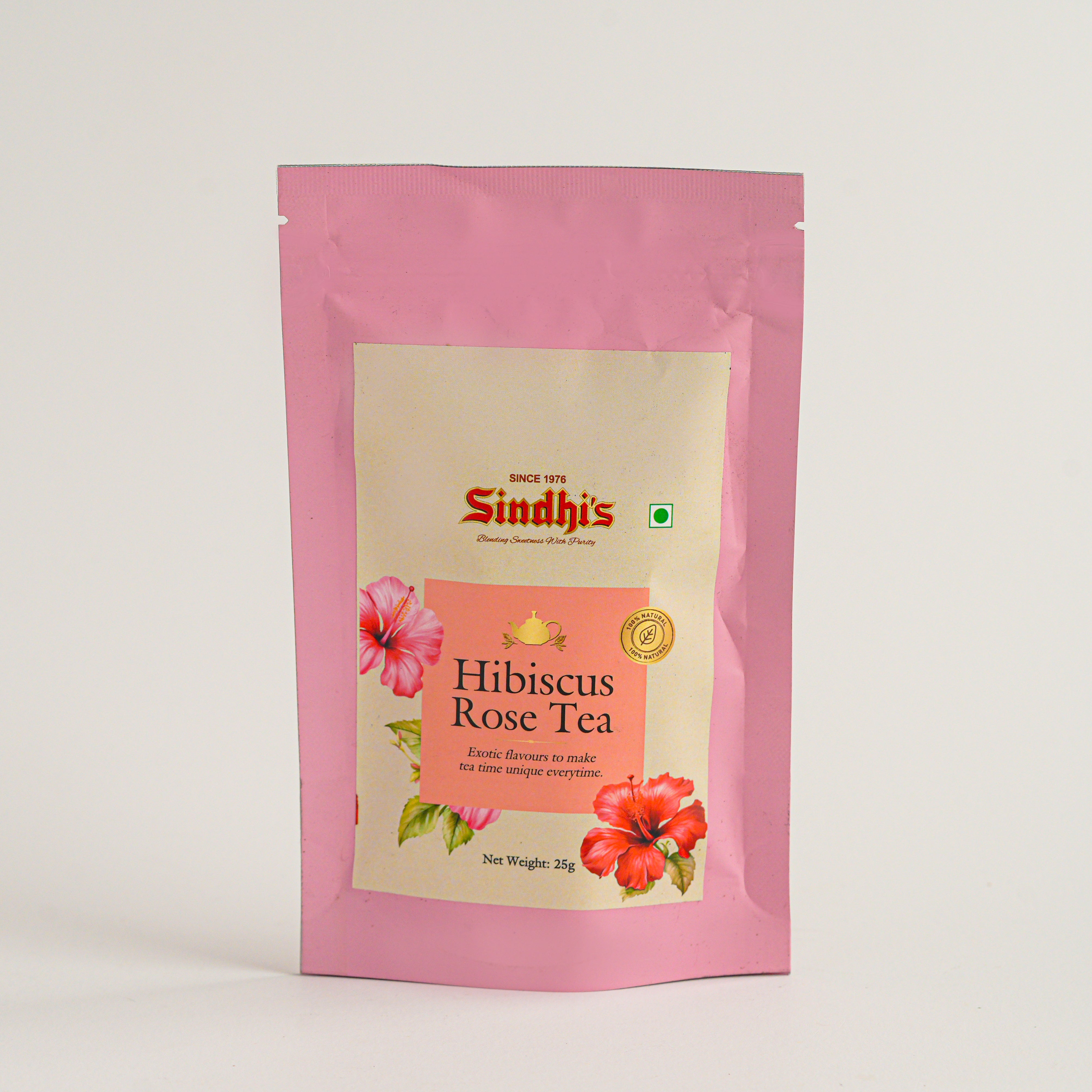 Sindhi's Hibiscus Rose Tea package with pink and beige design on a white background