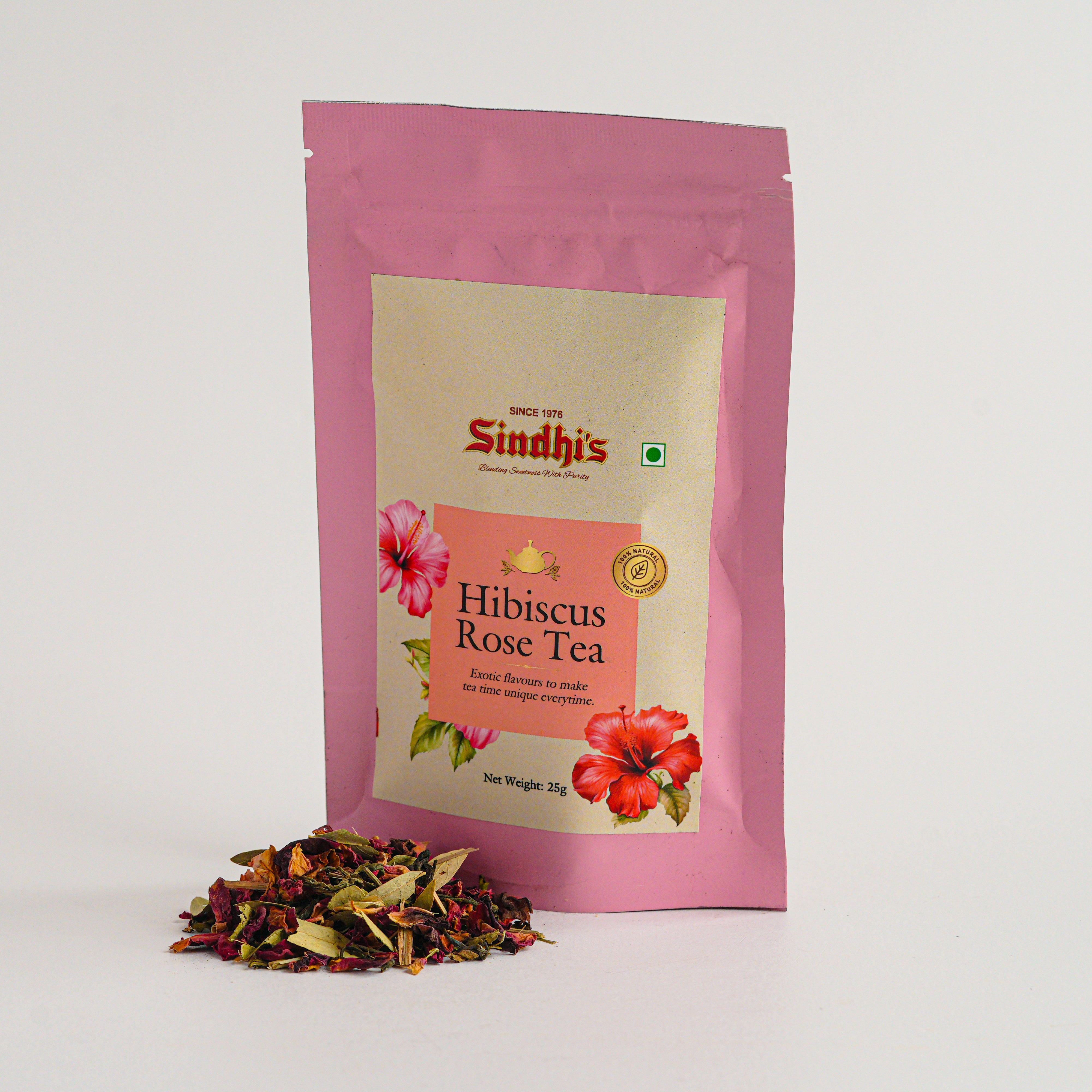Sindhi's Hibiscus Rose Tea package with loose tea leaves on a white background