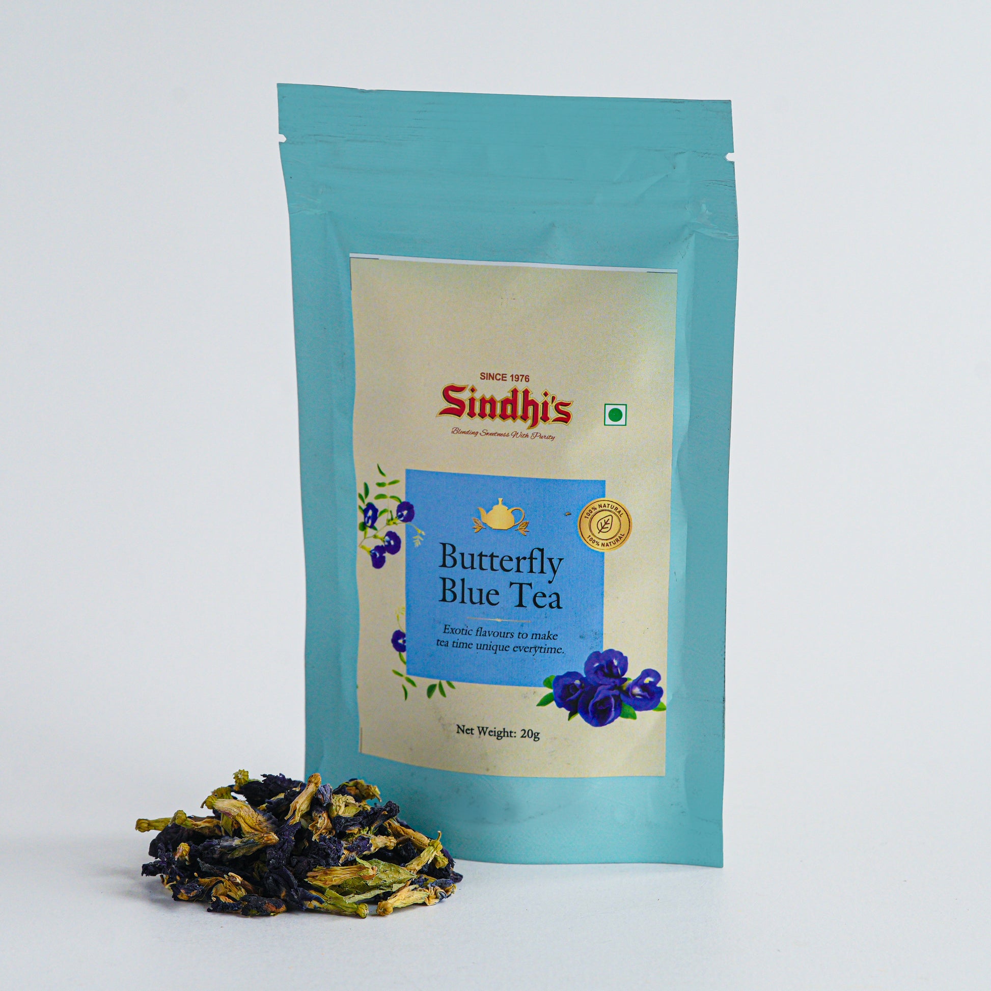 Tea package labeled 'Sindhis' with butterfly blue tea on a white background