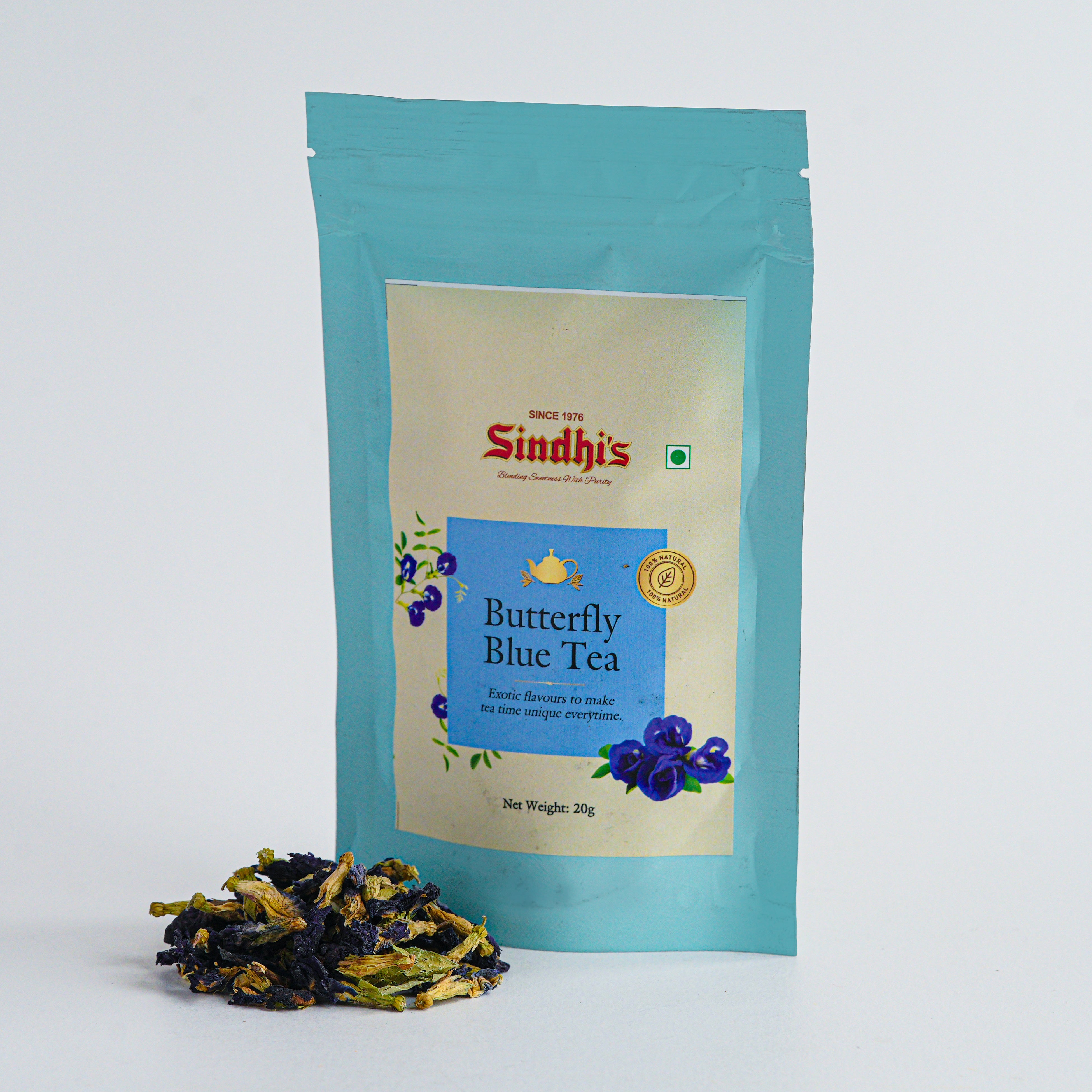 Tea package labeled 'Sindhis' with butterfly blue tea on a white background
