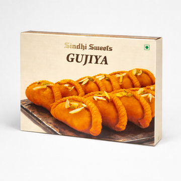 Box of Sindhi Sweets Gujiya on a white background