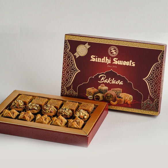 Box of Sindhi Sweets Baklava on a white background